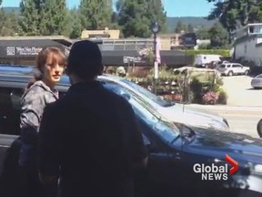 Global News in Vancouver filmed Golden Globe-nominated “Flashdance” star Jennifer Beals returning to her Ford Escape with her large dog inside and the window cracked a few inches. As she got back to her vehicle, a passerby confronted her and the 51-year-old actress replied: “It's fine. Thank you.” (THE CANADIAN PRESS/ho-courtesy-Catherine Urquhart/Global BC)