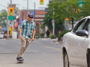 "There?s a freedom to it. You can do it anywhere, weather permitting. Your only opponent is yourself. . . . Some people look at it as a low-impact workout. It looks fun, and you can relive your youth." -- Pat Cleeve, 41, of London shown above skating down Dundas Street in London (MIKE HENSEN, The London Free Press)