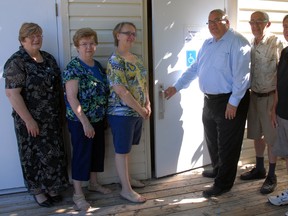 Members of St. Andrew's United Church and Elgin-Middlesex-London MP Joe Preston won't have to open doors by hand any longer thanks to a federal government grant that will pay for four automatic doors in the building. The $8,425 grant will help make the West Ave. church more accessible to elderly and disabled individuals.