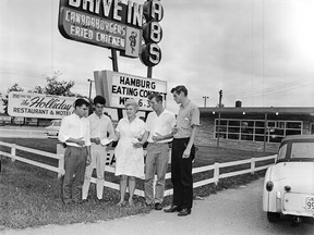 Winners of a Tabs drive-in hamburger eating contest are pictured here in this 1964 Sarnia Observer photo. PHOTO COURTESY OF LAMBTON COUNTY ARCHIVES (OBSERVER NEGATIVE COLLECTION #46218-02)