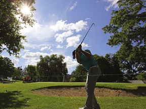 The children had the opportunity to golf with the pros hours before the Pro-Am tournament. Here is Eric Hawerchuk chipping from near the sand.