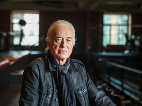 Led Zeppelin guitarist Jimmy Page poses for a photo at the Masonic Temple building in Toronto, Ont. on Monday July 20, 2015. Ernest Doroszuk/Postmedia Network