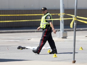 A 33-year-old woman was killed after being struck by a car near Siloam Mission on Thursday morning. Hours later, another person was killed in a collision near the corner of Arlington Street and William Avenue. (CHRIS PROCAYLO/WINNIPEG SUN)