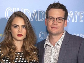 Cara Delevingne and John Green.

WENN