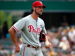 In this June 14, 2015, file photo, Philadelphia Phillies starting pitcher Cole Hamels collects himself on the mound during the fourth inning of a baseball game against the Pittsburgh Pirates in Pittsburgh. (AP Photo/Gene J. Puskar, File)
