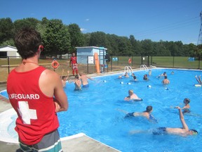 Head lifeguard Joshua Avery Scott keeps a watchful eye on swimmers at the new Camp Vincent pool.