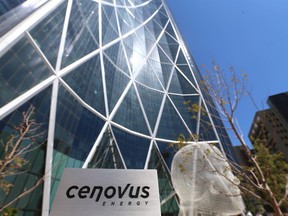 A Cenovus Energy sign is shown outside the Bow office tower in Calgary on Thursday July 30, 2015. (Jim Wells/Postmedia Network)