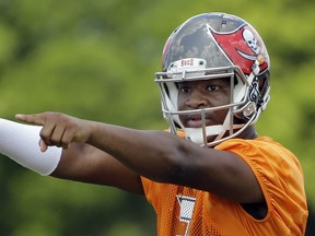 In this June 4, 2015, file photo, Tampa Bay Buccaneers quarterback Jameis Winston calls a play during an NFL football organized team activity in Tampa, Fla. (AP Photo/Chris O'Meara, File)