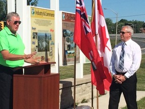 SAMANTHA REED/FOR THE INTELLIGENCER
MP Daryl Kramp speaks during an announcement Friday morning, while city councillor Jack Miller looks on. During the event, Kramp announced the provincial and federal government is granting millions in funding to the city for its Dundas Street rehab project.