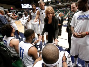 Texas Legends head coach Nancy Lieberman, centre, leads her team during a time out in an NBA Development League game against the Springfield Armor in Frisco, Texas. (AP Photo/Tony Gutierrez, File)