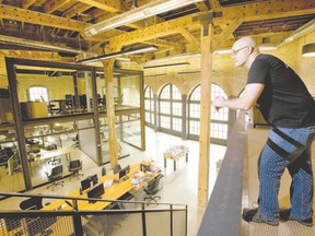 David Billson, president of Ellipsis Digital, surveys the firm?s new office space in the London Roundhouse on Horton Street. In addition to providing an inspiring workspace, the company has opened its doors to the community, even hosting a theatre troupe for a production of Romeo and Juliet as well as playing host to other community gatherings. (MIKE HENSEN, The London Free Press)