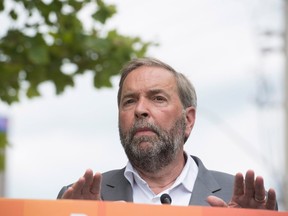 NDP Leader Tom Mulcair speaks in Waterloo, Ont., on Friday, July 24, 2015. Mulcair is on his Ontario Tour for Change where he shared his plans to create more jobs for Canadians, especially in Southwestern Ontario. THE CANADIAN PRESS/Hannah Yoon