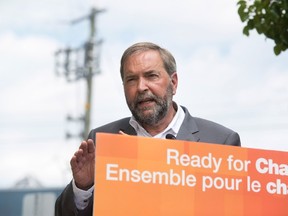 NDP Leader Tom Mulcair speaks in Waterloo, Ont., on Friday, July 24, 2015. Mulcair is on his Ontario Tour for Change where he shared his plans to create more jobs for Canadians, especially in Southwestern Ontario. (THE CANADIAN PRESS/Hannah Yoon)