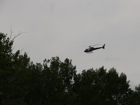 A helicopter assists in the search in Iroquois Falls for missing senior, Eric Hardman.