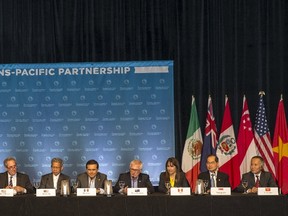 The twelve Trans-Pacific Partnership (TPP) Ministers hold a press conference to discuss progress in the negotiations in Lahaina, Maui, Hawaii July 31, 2015. Pacific Rim trade ministers failed to clinch a deal on Friday to free up trade between a dozen nations after a dispute flared between Japan and North America over autos, New Zealand dug in over dairy trade and no agreement was reached on monopoly periods for next-generation drugs. REUTERS/Marco Garcia