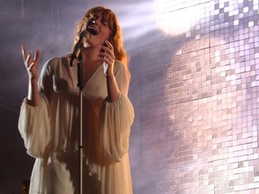 Florence Welsh of Florence + The Machine performs at the Osheaga Music and Arts Festival in Montreal on Friday, July 31, 2015. (John Williams, Postmedia Network)