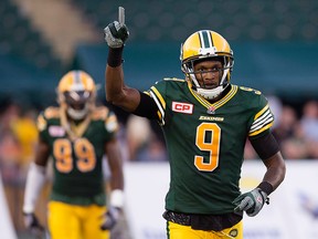 The Edmonton Eskimos' Patrick Watkins (9) celebrates his touchdown against the Saskatchewan Roughriders during second half CFL action at Commonwealth Stadium, in Edmonton Alta. on Friday July 31, 2015. The Eskimos won 30 - 5. David Bloom/Edmonton Sun/Postmedia Network