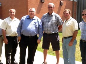The Municipality of Bayham on Friday received up to $250,000 in infrastructure funding for rehabilitation of the Straffordville Community Centre. Pictured from left - Deputy Mayor Tom Southwick, Mayor Paul Ens, Elgin-Middlesex-London MP Joe Preston, Coun. Wayne Casier, Coun. Ed Ketchabaw and Bayham CAO Paul Shipway.