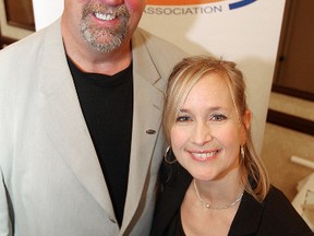 Former Winnipeg Blue Bomber Chris Walby (l) and former UofM volleyball player Michelle Sawatzky were among the athletes inducted into the MHSAA Hall of Fame during a ceremony in Winnipeg Saturday April 21, 2012. (BRIAN DONOGH/WINNIPEG SUN/QMI AGENCY)