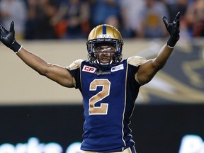 Winnipeg Blue Bombers' Matt Bucknor (2) celebrates a win over the B.C. Lions in CFL action in Winnipeg Thursday, July 30, 2015. (THE CANADIAN PRESS/John Woods)