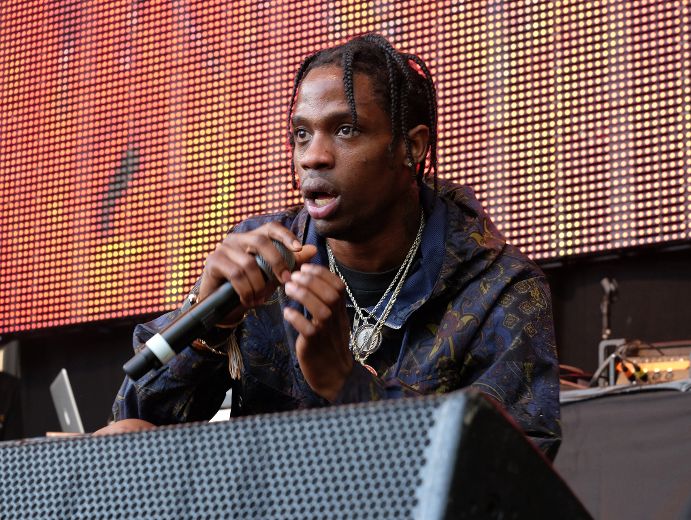 Rapper Travis Scott arrested after encouraging fans to crash stage ...