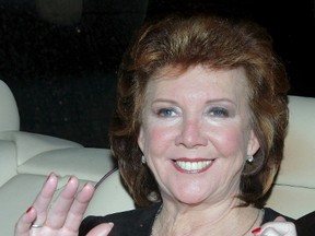 British television presenter Cilla Black arrives for the party to celebrate the civil ceremony of British pop star Elton John and David Furnish in Windsor, southern England, in this Dec. 21, 2005 file photo. Black has died at age 72. (REUTERS/Toby Melville/Files)