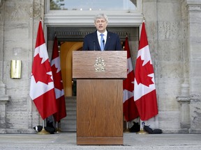 Prime Minister Stephen Harper takes part in a news conference at Rideau Hall after asking Governor General David Johnston to dissolve Parliament, beginning the longest federal election campaign in recent history, in Ottawa August 2, 2015.     REUTERS/Blair Gable