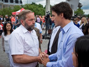 NDP Leader Tom Mulcair and Liberal Leader Justin Trudeau at the  Pride Parade in Montreal in August 2014. (Toronto Sun Files)
