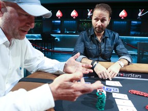 Mike Strobel (left) loses to poker great Daniel Negreanu. (VERONICA HENRI, Toronto Sun)