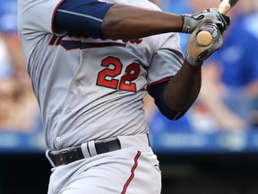 Miguel Sano of the Minnesota Twins hits an RBI single on July 3, 2015.  Sano is having a breakout rookie season. (ORLIN WAGNER/AP)