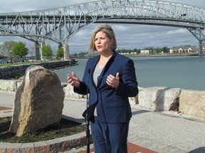 NDP Leader Andrea Horwath in shown in this file photo from June speaking about high electricity prices during a campaign stop next to the Bluewater Bridge. She is scheduled to hold a town hall meeting in Sarnia Wednesday on the possible sale of Hydro One. FILE PHOTO/ THE OBSERVER