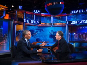 In this July 21, 2015 file photo, President Barack Obama, left, talks with Jon Stewart, host of "The Daily Show with Jon Stewart" during a taping in New York.  (AP Photo/Evan Vucci, File)