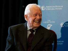 Former U.S. president Jimmy Carter speaks at the opening of a new exhibit, "Countdown to Zero, Defeating Disease" at the American Museum of Natural History in New York, in this Jan. 12, 2015 file photo. (REUTERS/Mike Segar/Files)