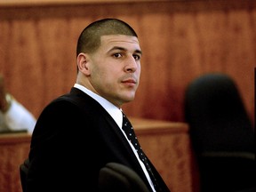 Former New England Patriots tight end Aaron Hernandez sits during his murder trial at Bristol County Superior Court in Fall River, Massachusetts, April 6, 2015.  REUTERS/Ted Fitzgerald/Pool