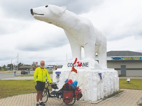 Brian Costello is greeted by Chimo on this trip across Canada.