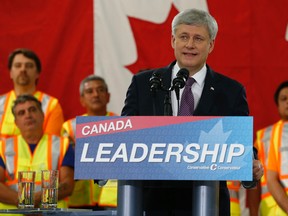 Prime Minister Stephen Harper at Olympia Tile in Toronto on Tuesday August 4, 2015 to make an announcement about home renovation tax credits. (Jack Boland/Toronto Sun)
