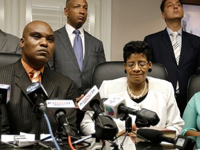 Attorney Cannon Lambert, left, along with Sandra Bland's mother, Geneva Reed-Veal, centre, and sister Sierra Cole hold a news conference, Tuesday, Aug. 4, 2015, in Houston.  (AP Photo/Pat Sullivan)