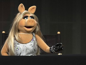 The Muppets character Miss Piggy speaks at a panel for the Disney-ABC television series "The Muppets" during the Television Critics Association Cable Summer Press Tour in Beverly Hills, California August 4, 2015. REUTERS/Mario Anzuoni