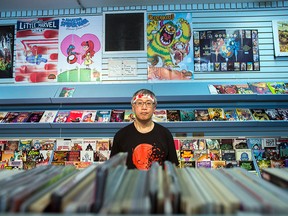 OTTAWA — August 4, 2015 – Kin Jee, owner of Silver Snail. Citing economic troubles, Jee will be closing the doors of the Silver Snail’s downtown Ottawa location in mid-September. He opened the store on March 9, 1990, in a time when the comic business was booming. (DANI-ELLE DUBE/Ottawa Sun/Postmedia Network)