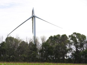 Officials with wind-energy company NextEra Canada are investigating what damaged a 50-metre-long blade on this wind turbine near Crediton, southwest of Exeter, after the area was blasted by storms. (DEREK RUTTAN, The London Free Press)