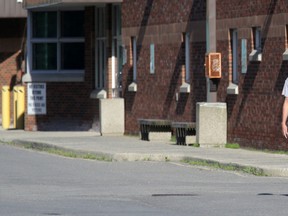 OTTAWA — Aug 4, 2015 — Andrej Szczypka, the alleged National War Memorial 'fornicator', walks out of the Regional Detention Centre (OCDC) after being released on bail in Ottawa, Tuesday, August 4, 2015. Szczypka, who resides in Toronto, will make his next court appearance on August 27. Mike Carroccetto / Ottawa Sun/Postmedia Network