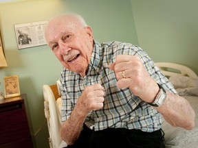 Cliff McWhirter, putting  up his dukes in his room at Extendicare London nursing home London in 2013, is seen at right in 1932, the year he won the Golden Gloves crown in a bout in Cincinnati. (CRAIG GLOVER, The London Free Press)