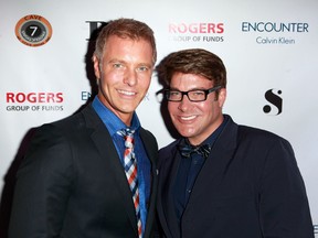 Steven Sabados (L) and Chris Hyndman attend the "The Secret Disco Revolution" Party during the 2012 Toronto International Film Festival at The Courthouse on September 8, 2012 in Toronto. (GETTY IMAGES/AFP)