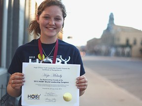 Hope Melady shows the certificate she received while attending an international seminar in Chicago.(Shaun Gregory/Huron Expositor)