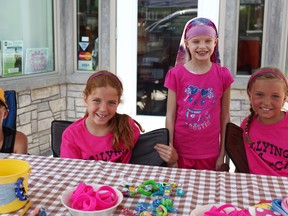 From the left, Corey Stackhouse, Morgan Marks, Rebecca Kipfer-Pryce and Bailey Stackhouse. The group planned a fundraising event for Kipfer-Pryce on Main St last week.(Shaun Gregory/Huron Expositor)