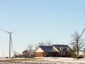 Homes near Kerwood have wind turbines in view west of London, Ont. on Wednesday January 28, 2015.