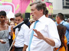Toronto Mayor John Tory speaks to the media about the deadly shootings at OVO Fest after-party Tuesday August 4, 2015. (Jack Boland/Toronto Sun)