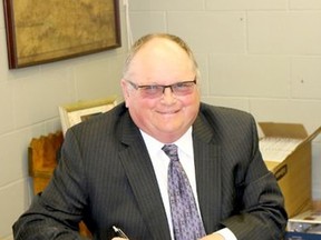 BRUCE BELL FILE PHOTO
Former Prince Edward County mayoral candidate Jeff Goddard, pictured here signing his election papers in 2014, passed away on Tuesday, Aug. 4.