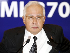 Malaysia's Prime Minister Najib Razak confirms the debris found on Reunion Island is from missing Malaysia Airlines flight MH370 in Kuala Lumpur, Malaysia, August 6, 2015. Razak confirmed early Thursday that a Boeing 777 wing segment discovered in the Indian Ocean island of Reunion is from the missing Flight MH370, the first real breakthrough in the search for the plane that disappeared 17 months ago.   REUTERS/Olivia Harris