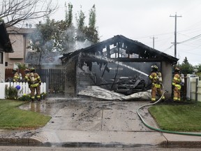 A fiery explosion ripped through a garage at at 5208 122 Ave. in the Clareview neighbourhood Wednesday morning but residents sprung to action to ensure no one was hurt. Claire Theobald/Edmonton Sun